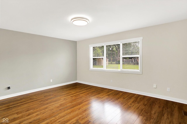 126 E 86th St, Indianapolis, IN 46240 - spare room featuring baseboards and wood finished floors