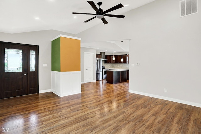 126 E 86th St, Indianapolis, IN 46240 - unfurnished living room with vaulted ceiling, wood finished floors, a ceiling fan, and recessed lighting