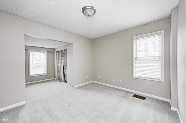 148 S 3rd Ave, Beech Grove, IN 46107 - carpeted spare room featuring baseboards