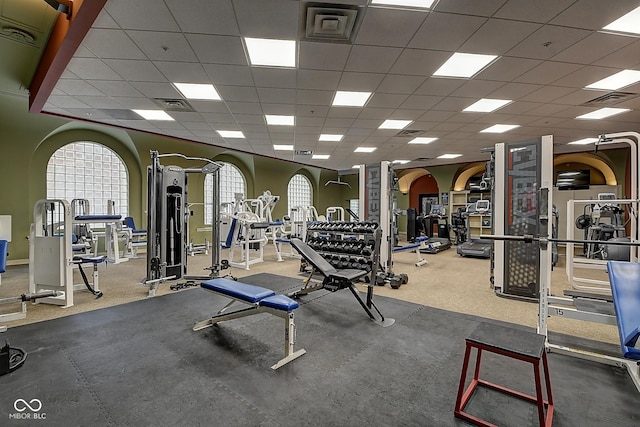 350 N Meridian St Unit A303, Indianapolis, IN 46204 - workout area featuring a paneled ceiling and plenty of natural light