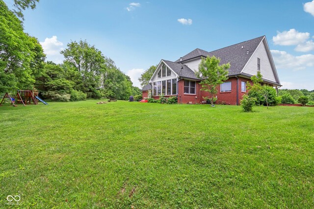 3564 Clear Creek Blvd, Martinsville, IN 46151 - view of grassy yard with a playground
