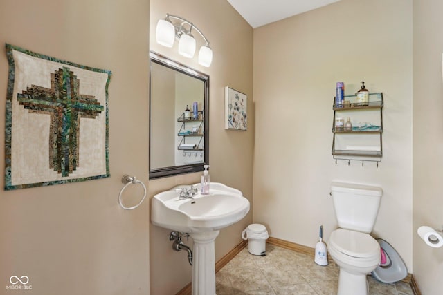 3564 Clear Creek Blvd, Martinsville, IN 46151 - half bathroom featuring toilet, baseboards, and tile patterned flooring
