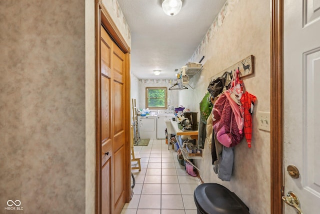 3564 Clear Creek Blvd, Martinsville, IN 46151 - washroom with washing machine and clothes dryer and light tile patterned floors