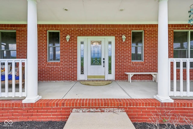 3564 Clear Creek Blvd, Martinsville, IN 46151 - doorway to property featuring a porch and brick siding