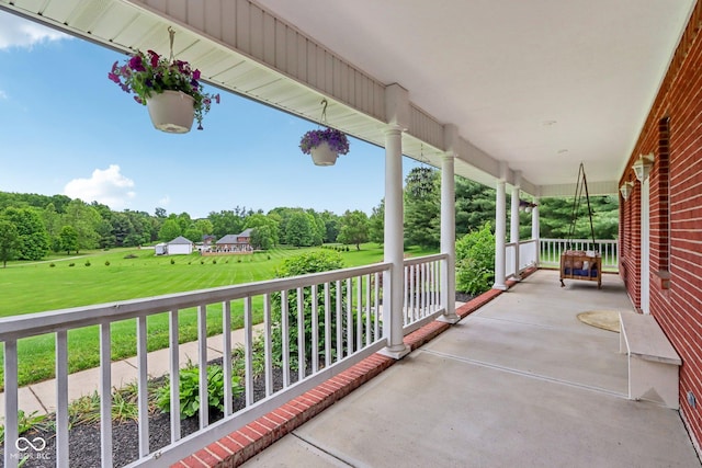 3564 Clear Creek Blvd, Martinsville, IN 46151 - covered porch featuring view of scattered trees