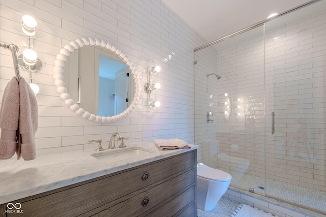 11101 Hawthorn Rdg, Fishers, IN 46037 - bathroom featuring vanity, a stall shower, tile walls, and decorative backsplash