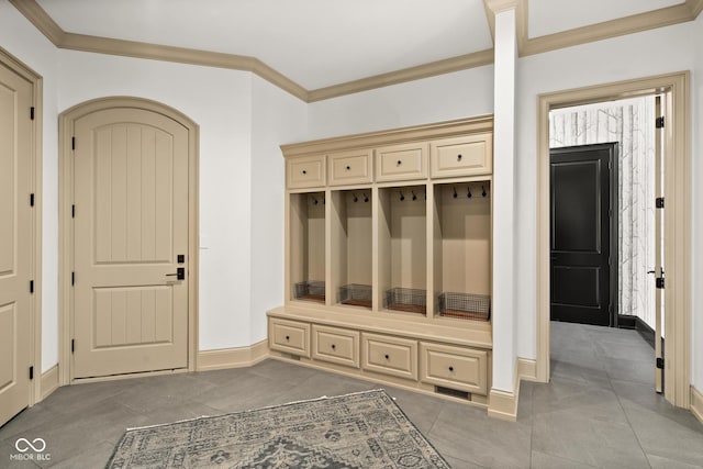 11101 Hawthorn Rdg, Fishers, IN 46037 - mudroom with crown molding and light tile patterned floors