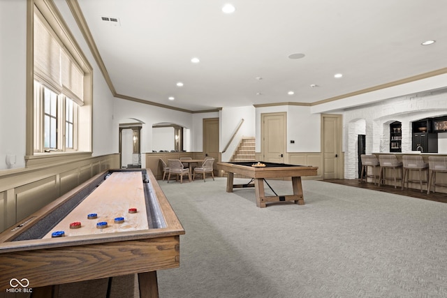 11101 Hawthorn Rdg, Fishers, IN 46037 - playroom featuring billiards, ornamental molding, a community bar, recessed lighting, and a wainscoted wall