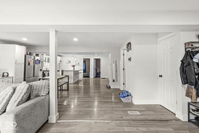 2 S 25th Ave, Beech Grove, IN 46107 - entryway featuring wood finished floors, recessed lighting, baseboards, and french doors