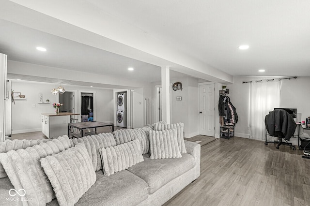 2 S 25th Ave, Beech Grove, IN 46107 - living area featuring estacked washer and dryer, recessed lighting, baseboards, and light wood finished floors