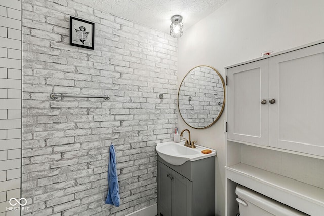 2 S 25th Ave, Beech Grove, IN 46107 - bathroom with vanity, a textured ceiling, and toilet