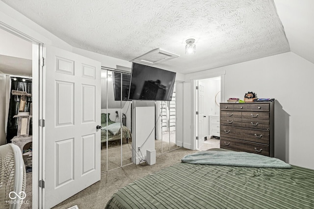 2 S 25th Ave, Beech Grove, IN 46107 - bedroom with attic access, light carpet, a textured ceiling, and a closet