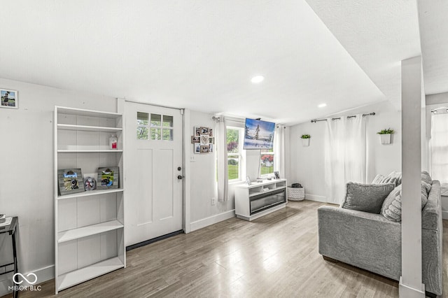 2 S 25th Ave, Beech Grove, IN 46107 - living room with baseboards, wood finished floors, and recessed lighting