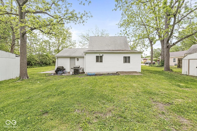 2 S 25th Ave, Beech Grove, IN 46107 - back of property with a yard and roof with shingles