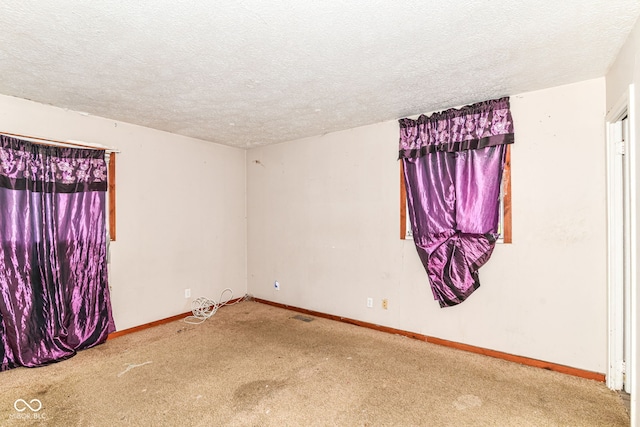 6238 E 43rd St, Indianapolis, IN 46226 - empty room with carpet, a textured ceiling, and baseboards
