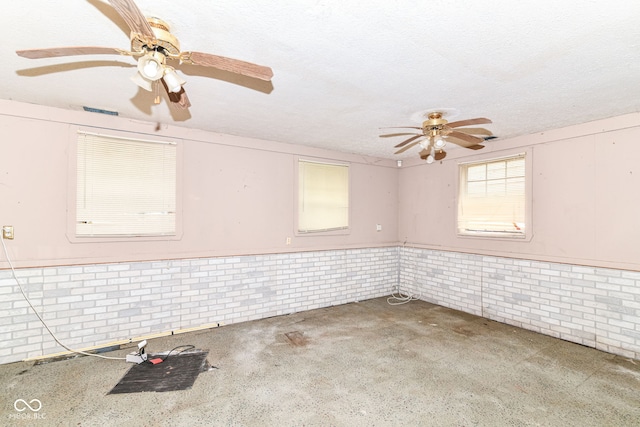 6238 E 43rd St, Indianapolis, IN 46226 - spare room with ceiling fan, carpet flooring, and a textured ceiling