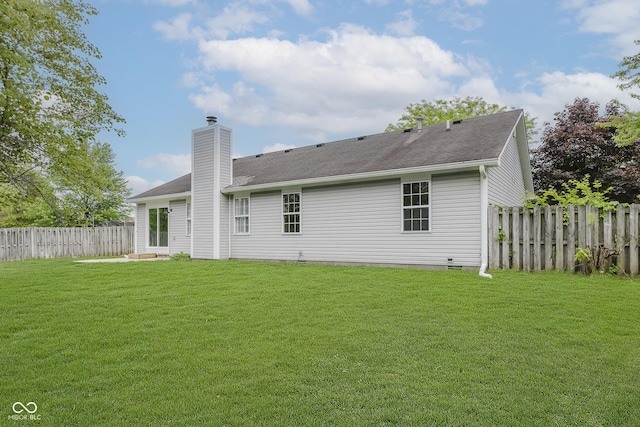 374 Pomona Ct, Greenfield, IN 46140 - back of property featuring a chimney and a shingled roof