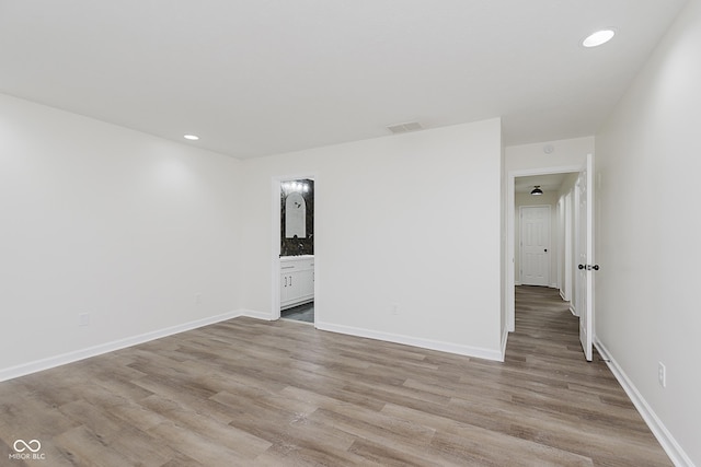 374 Pomona Ct, Greenfield, IN 46140 - spare room with light wood-style flooring, recessed lighting, and baseboards