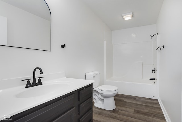 374 Pomona Ct, Greenfield, IN 46140 - full bath with toilet, vanity, wood finished floors, and tub / shower combination