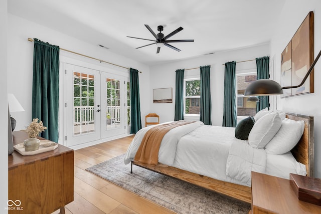 3215 N Pennsylvania St, Indianapolis, IN 46205 - bedroom featuring french doors, access to outside, light wood-style floors, and ceiling fan