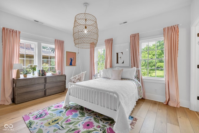 3215 N Pennsylvania St, Indianapolis, IN 46205 - bedroom with light wood-type flooring and baseboards