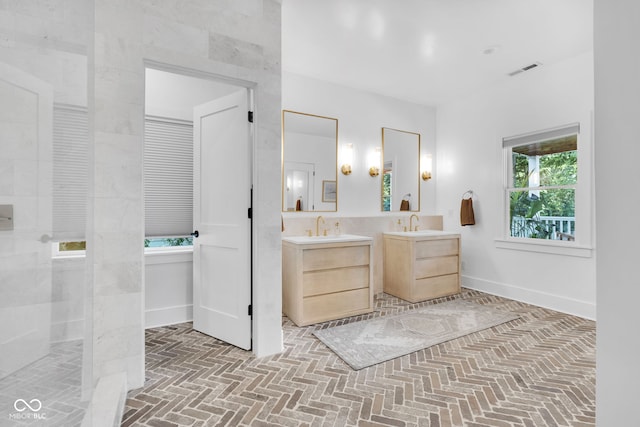 3215 N Pennsylvania St, Indianapolis, IN 46205 - full bathroom featuring vanity, brick patterned flooring, baseboards, and walk in shower