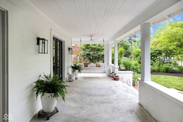 3215 N Pennsylvania St, Indianapolis, IN 46205 - covered porch featuring ceiling fan
