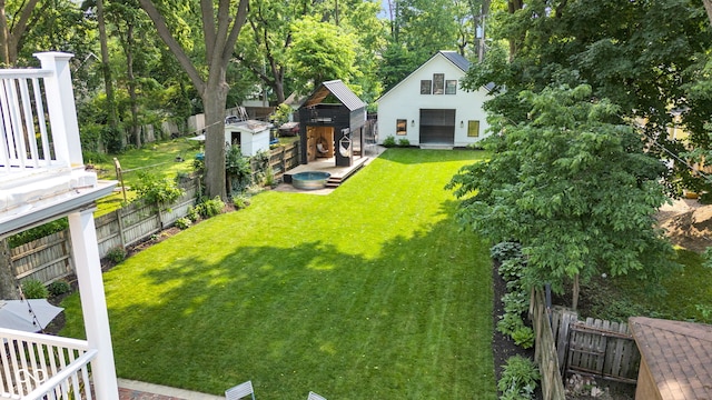 3215 N Pennsylvania St, Indianapolis, IN 46205 - view of yard with a garage and view of wooded area