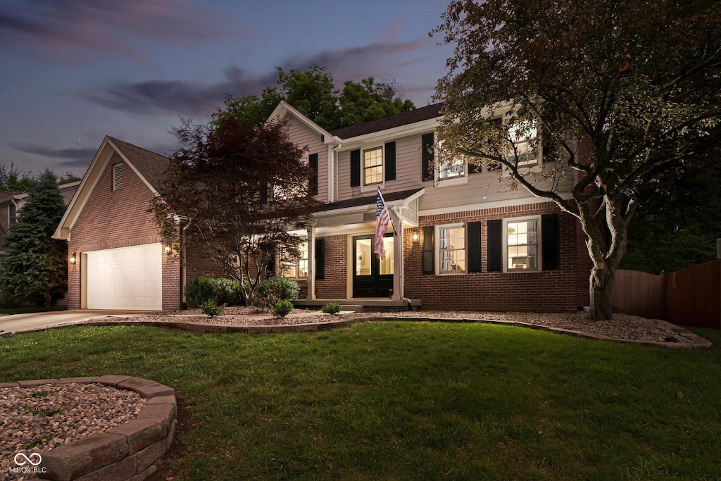 10243 Brixton Ln, Fishers, IN 46037 - view of front of house featuring brick siding and concrete driveway