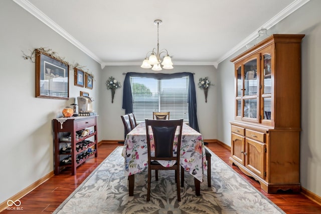 4434 W Windsong Ct, New Palestine, IN 46163 - dining area featuring a chandelier, crown molding, dark wood-style floors, and baseboards