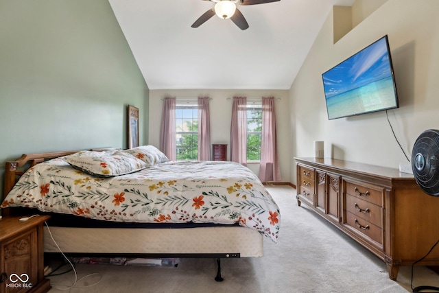 4434 W Windsong Ct, New Palestine, IN 46163 - bedroom with vaulted ceiling, light carpet, and a ceiling fan