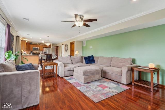 4434 W Windsong Ct, New Palestine, IN 46163 - living area with wood finished floors, ornamental molding, and ceiling fan