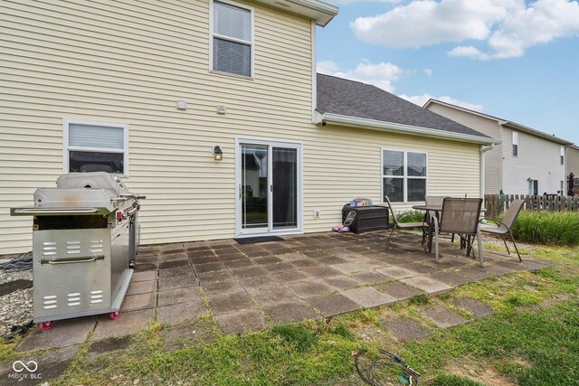 4434 W Windsong Ct, New Palestine, IN 46163 - rear view of house featuring a patio area and a shingled roof