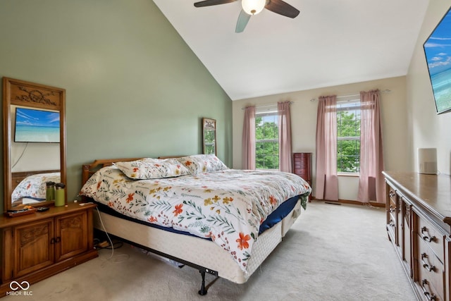 4434 W Windsong Ct, New Palestine, IN 46163 - bedroom featuring light colored carpet, high vaulted ceiling, and a ceiling fan