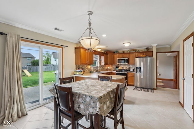 4434 W Windsong Ct, New Palestine, IN 46163 - dining space featuring light tile patterned flooring and crown molding