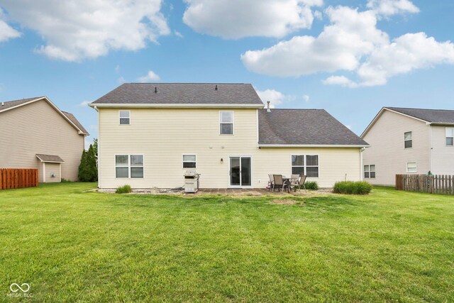 4434 W Windsong Ct, New Palestine, IN 46163 - back of house with a patio area and a shingled roof