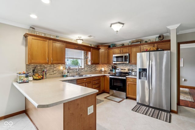 4434 W Windsong Ct, New Palestine, IN 46163 - kitchen with stainless steel appliances, a sink, a peninsula, ornamental molding, and light countertops