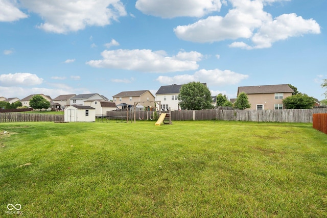 4434 W Windsong Ct, New Palestine, IN 46163 - view of yard with a residential view and a playground