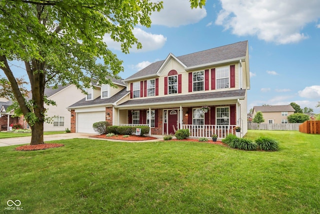 4434 W Windsong Ct, New Palestine, IN 46163 - colonial house with a porch, driveway, brick siding, and a garage