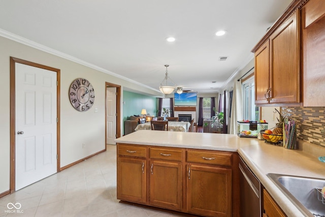 4434 W Windsong Ct, New Palestine, IN 46163 - kitchen with a peninsula, dishwasher, ornamental molding, decorative backsplash, and brown cabinets