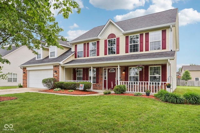 4434 W Windsong Ct, New Palestine, IN 46163 - colonial house featuring a porch, concrete driveway, brick siding, and an attached garage