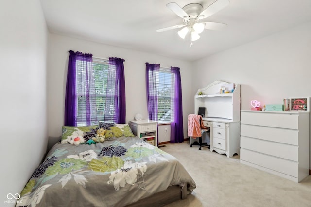 4434 W Windsong Ct, New Palestine, IN 46163 - bedroom featuring light carpet and a ceiling fan