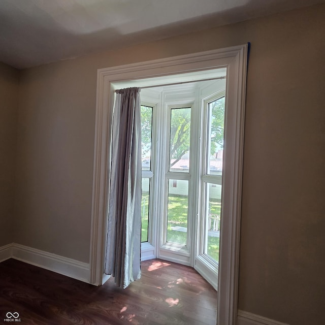 517 E Mechanic St, Brazil, IN 47834 - entryway with baseboards and wood finished floors