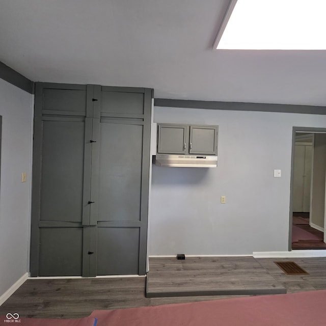 517 E Mechanic St, Brazil, IN 47834 - kitchen featuring gray cabinets, wood finished floors, and baseboards