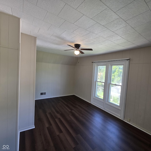 517 E Mechanic St, Brazil, IN 47834 - unfurnished room with dark wood-style flooring, baseboards, and a ceiling fan