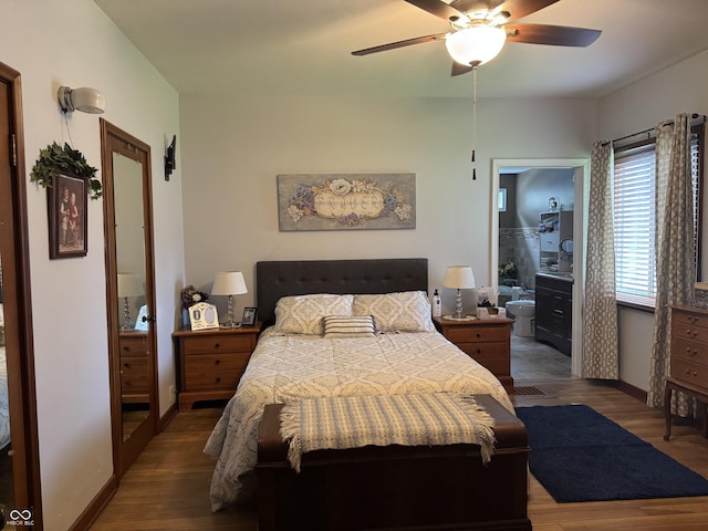 532 N Franklin St, Greensburg, IN 47240 - bedroom featuring wood finished floors, ensuite bath, a ceiling fan, and baseboards