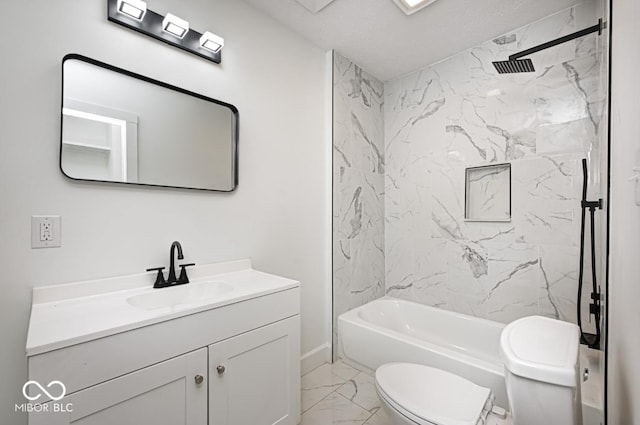 815 E 24th St E, Indianapolis, IN 46205 - full bath featuring marble look tile flooring, toilet, vanity, and bathing tub / shower combination