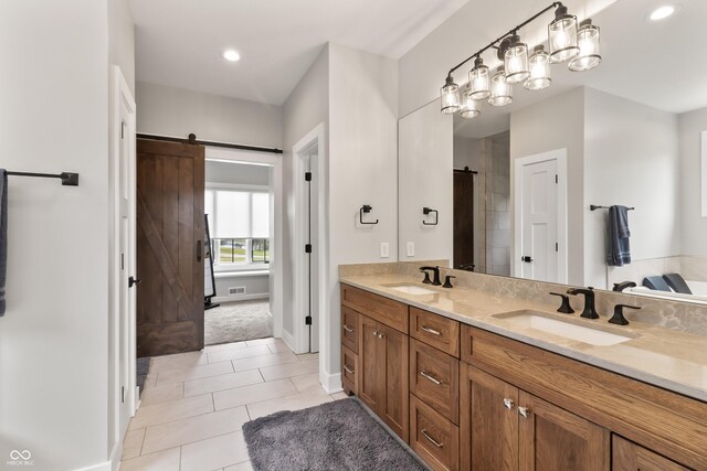 4808 Lakeview Dr, Greenwood, IN 46143 - bathroom with double vanity, tile patterned flooring, baseboards, recessed lighting, and a shower