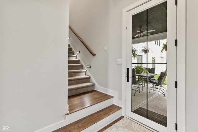 4808 Lakeview Dr, Greenwood, IN 46143 - staircase with baseboards and wood finished floors