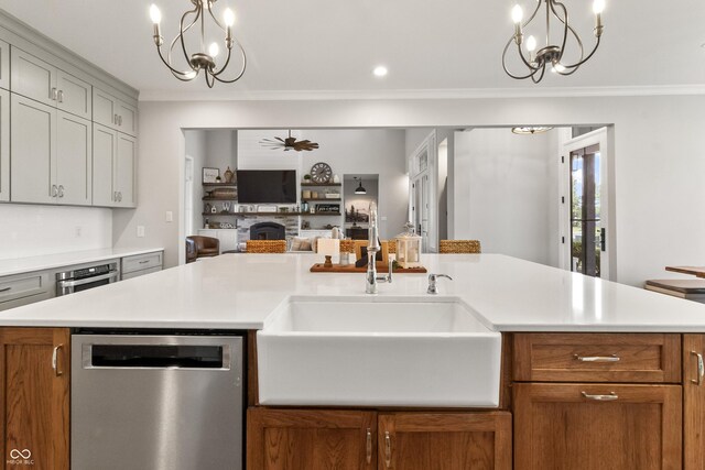 4808 Lakeview Dr, Greenwood, IN 46143 - kitchen featuring a chandelier, stainless steel dishwasher, a sink, a fireplace, and ornamental molding
